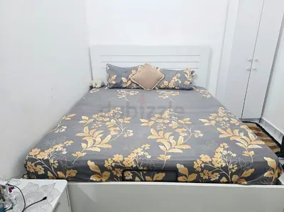 King size hydraulic bed frame with storage, 2 side tables, 8 inch spring mattress. 2 pillows free.