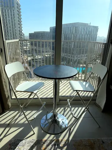 Bar table with two foldable chairs