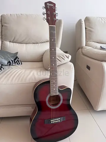 Red sunburst acoustic guitar - good condition