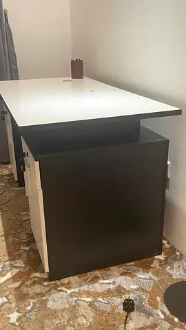 Modern white-top study desk with black storage pedestal