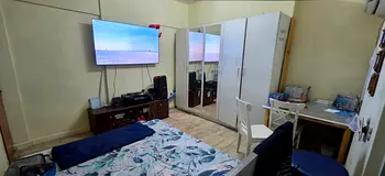 Furnished room with balcony available for couples or ladies