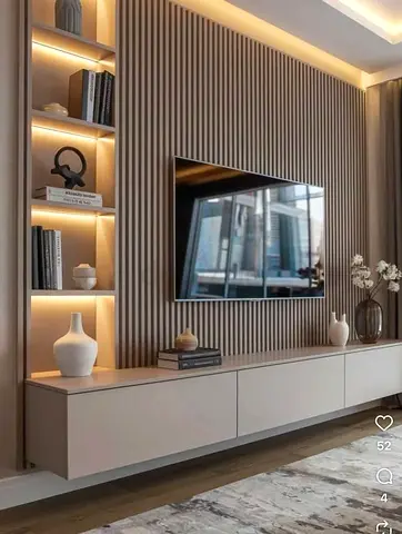 Modern wall-mounted entertainment unit with panels and light