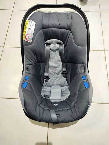Used infant car seat (rear-facing) with removable insert - good condition