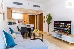 Brand New 1BR Apartment in JVC | King Bed + Sofa Bed | Fully Equipped Kitchen | Pool & Gym | Acc