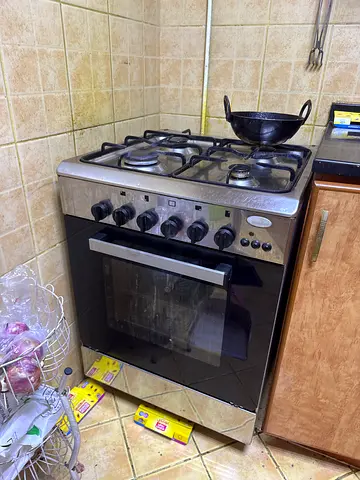 Used freestanding gas oven and 4-burner stove - stainless steel