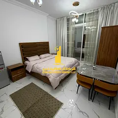 Sea view, a fully furnished luxury studio with a semi-separate kitchen and balcony ✨ Ajman Oasis T