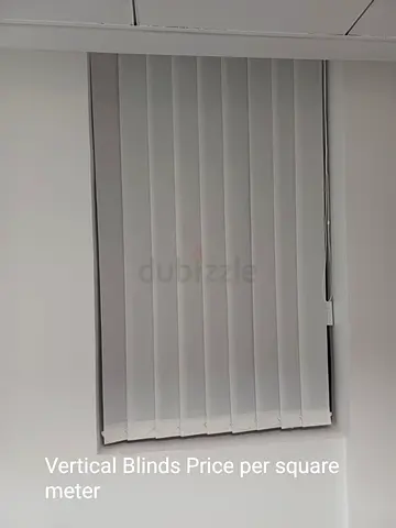White vertical blinds — good condition, ready to install