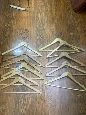 Set of 10 wooden clothes hangers - sturdy, good condition