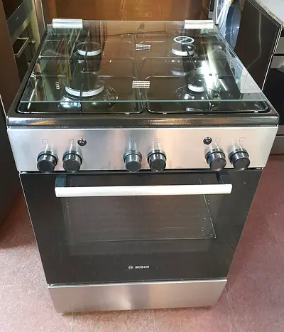 Bocsh brand cooker full gas size 60by60cm 4 burnal new model working A1 very good condition and ever