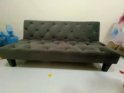 Compact tufted convertible sofa bed - dark gray