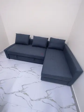 Ikea L Shape Sofa cum bed with big storage in L