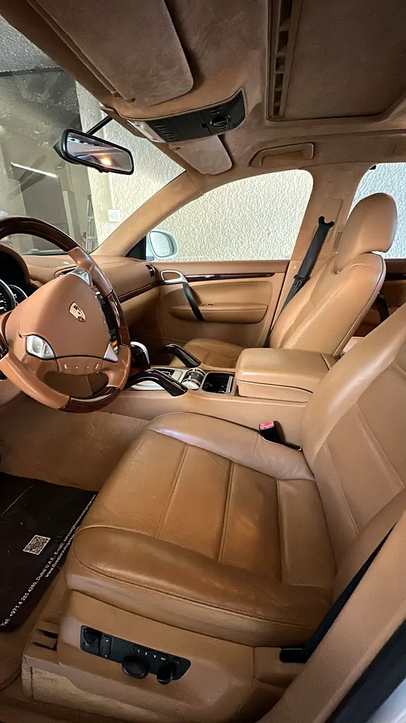 Porsche Cayenne 2009 — photo 1 of 9