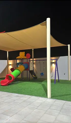 Playground set with slide, swings and shade sails - good condition