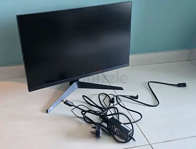 24-inch LED Monitor with Stand and Power Adapter - Very Good Condition. Original price 450aed