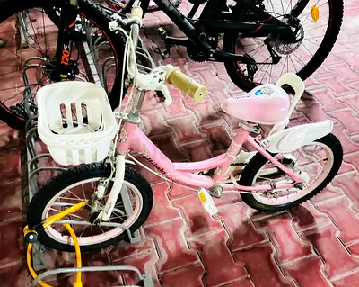 Pink Kids Bicycle with Training Wheels and Front Basket - Good Condition
