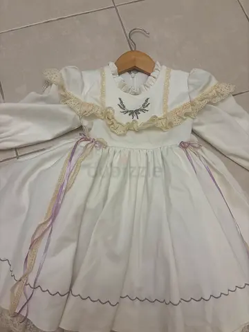 White Vintage-Style Baby Dress with Lace and Ribbon Detail -