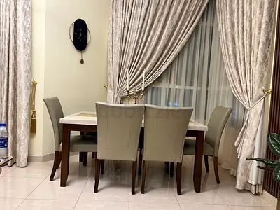 Home center 6 seater marble dinning table