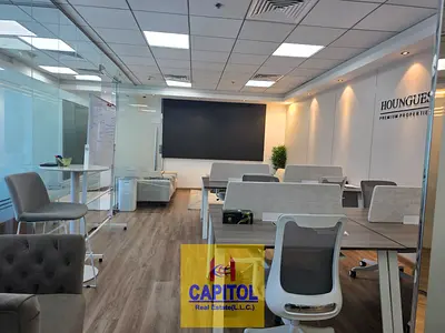 WELL FURNISHED OFFICE WITH 4 GLASS PARTITION AVAILABLE FOR RENT IN BUSINESS BAY
