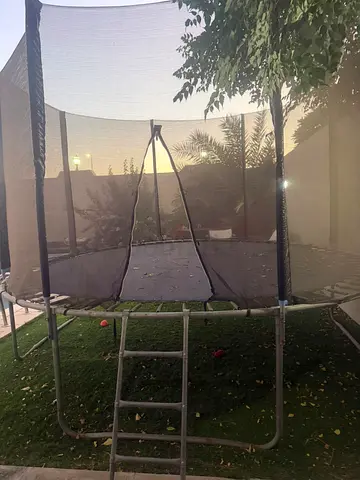 Used 12ft Trampoline with Safety Net and Ladder