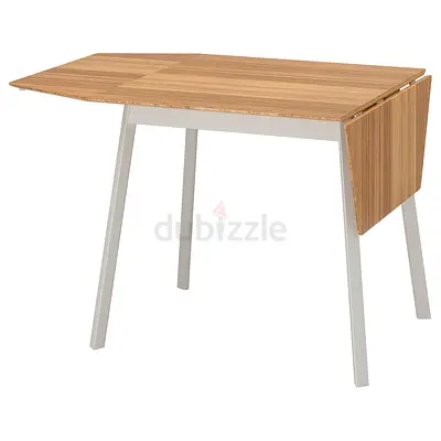 Small folding dining table - wooden top with white legs and comes with 4 chairs
