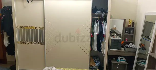 Beige Sliding Door Wardrobe with Mirror and Shelves - Good Condition