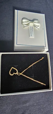 Gold-tone heart pendant necklace with chain — like new