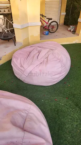 Pair of pink outdoor bean bag chairs - gently used