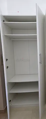 White 2-Door Wardrobe IKEA PAX 220x50x60 with Shelves and Hanging Rail - Good Condition
