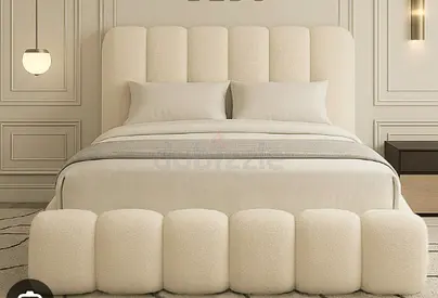 Modern upholstered king bed with curved padded headboard