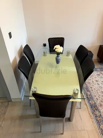 Urgent Sale- Glass Top Dining Table with 6 Black Leather Chairs