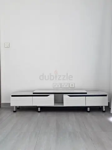 Low-profile modern TV cabinet with drawers - marble effec
