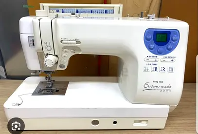 Baby lock heavy duty  computer fast speed  and soundles tailoring sewing and  embroidery machine