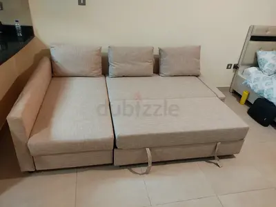 Ikea L Shape Sofa cum bed with big storage in L