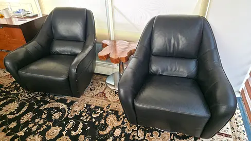 Domicil leather swivel lounge chairs