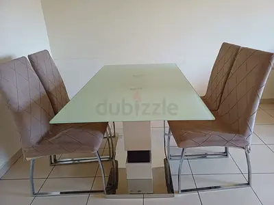 Glass Top Dining Table with 4 Upholstered Chairs - Good Condition
