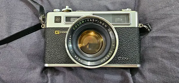 Vintage Yashica Electro 35 Camera with stand