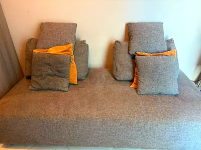 Two separate grey sofas from Home Centre