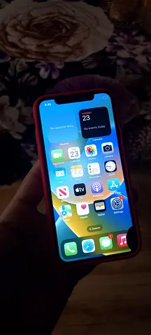 iPhone X in red case with iOS 16 - Good working condition