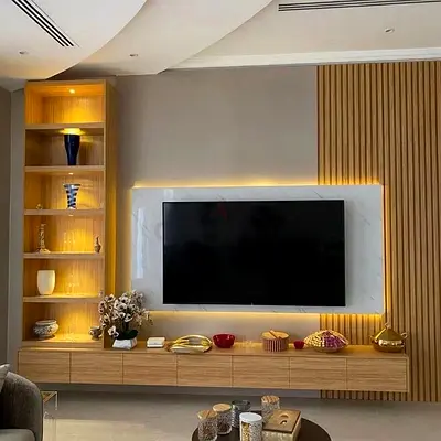 Wall-mounted entertainment unit with built-in display shelves and LED backlight