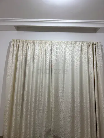 Cream patterned full-length curtains - ready to hang