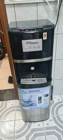 Black stainless bottom-load water dispenser - good working condition