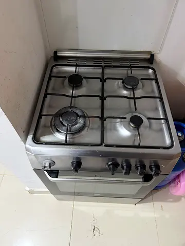 Used 4-Burner Stainless Steel Gas Stove — Good Working Condition