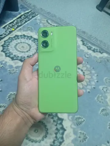 Green Motorola smartphone in good condition - clean back, dual camera just 2 days used