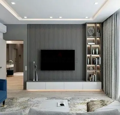 Modern built-in TV entertainment wall unit with open shelving