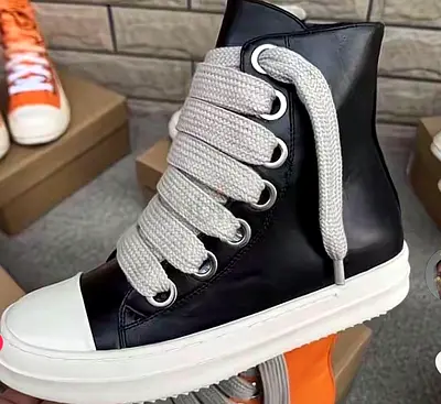 Black High-Top Sneakers with Thick White Laces - Size Unspecified