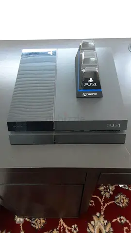 PS4 Base Model with controller stand for SALE (no controllers, wires)