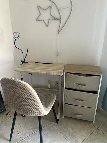 Compact desk with fabric drawer unit.
