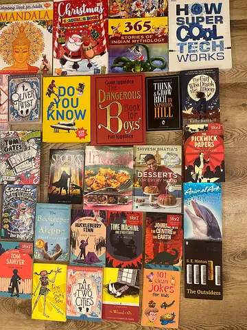 Mixed collection of used paperback and hardcover books – fiction, nonfiction, children’s titles