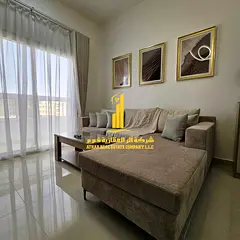 Near Ajman University, a luxurious and elegant fully furnished room and living room with brand new V