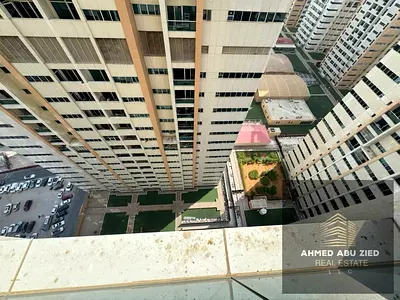 Two bedrooms and a living room for annual rent, fully furnished, partial sea view - Al Rashidiya 3 - Ajman One Towers